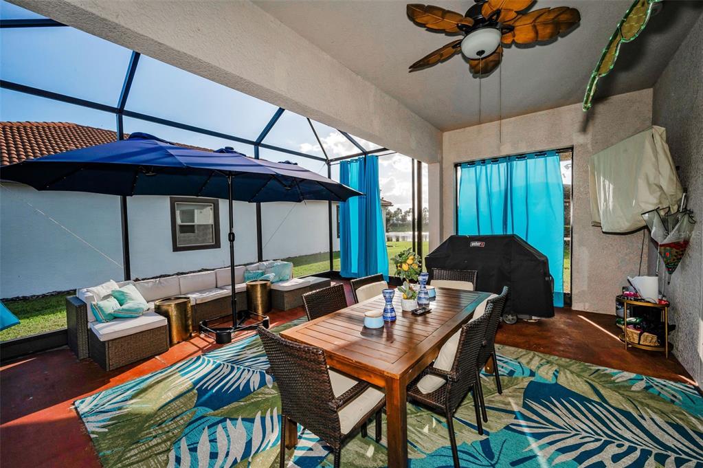 16833 Banner Shell Place Wimauma, FL 33598 - Photo 31 of 55 a dining room with furniture and window