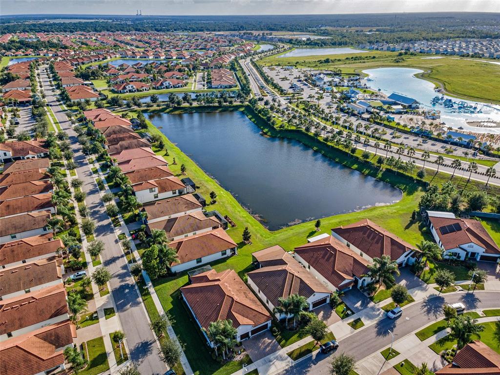 16833 Banner Shell Place Wimauma, FL 33598 - Photo 39 of 55 an aerial view of residential houses with outdoor space and swimming pool