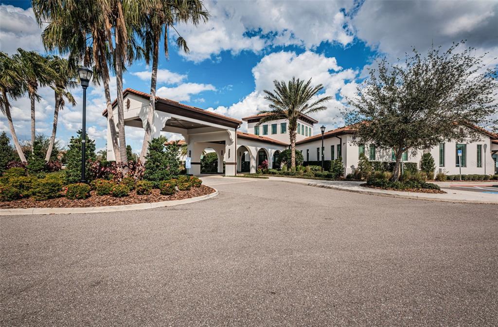 16833 Banner Shell Place Wimauma, FL 33598 - Photo 42 of 55 front view of a building with a street
