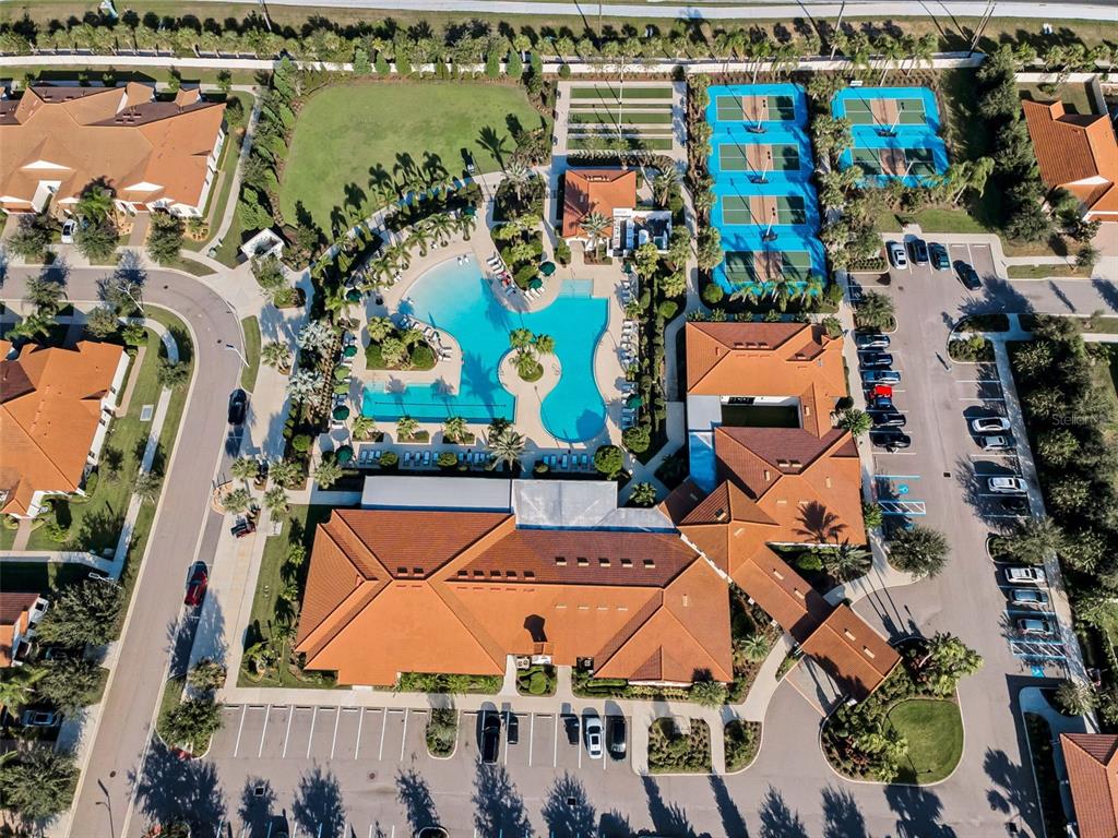 16833 Banner Shell Place Wimauma, FL 33598 - Photo 43 of 55 an aerial view of residential houses with outdoor space and swimming pool