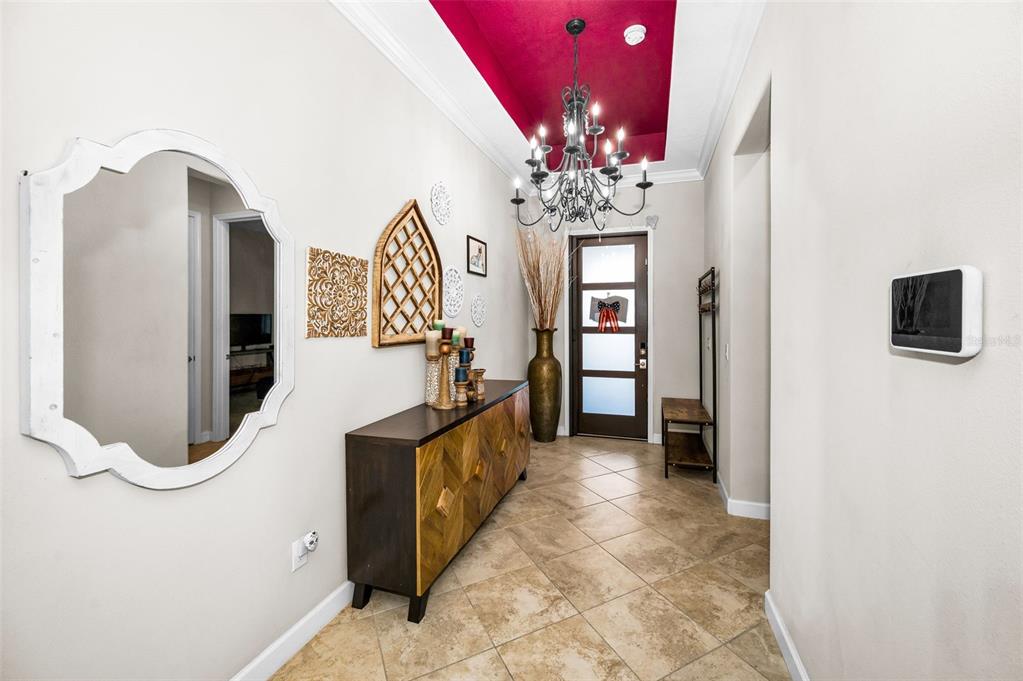 16833 Banner Shell Place Wimauma, FL 33598 - Photo 5 of 55 a bathroom with a sink mirror and a shower