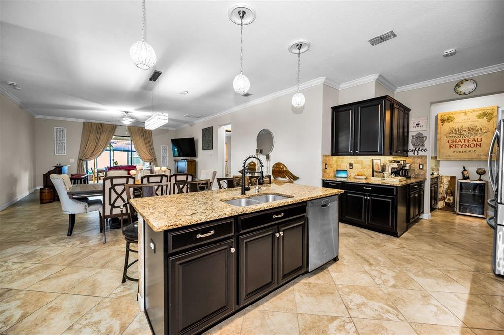 16833 Banner Shell Place Wimauma, FL 33598 - Photo 6 of 55 a kitchen with lots of counter top space