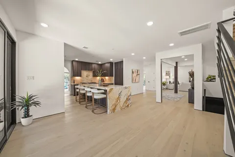 a living room with furniture and a table