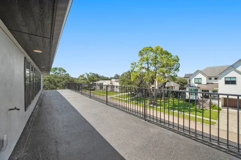 a view of a street from balcony