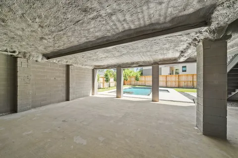 a view of an empty room with a balcony