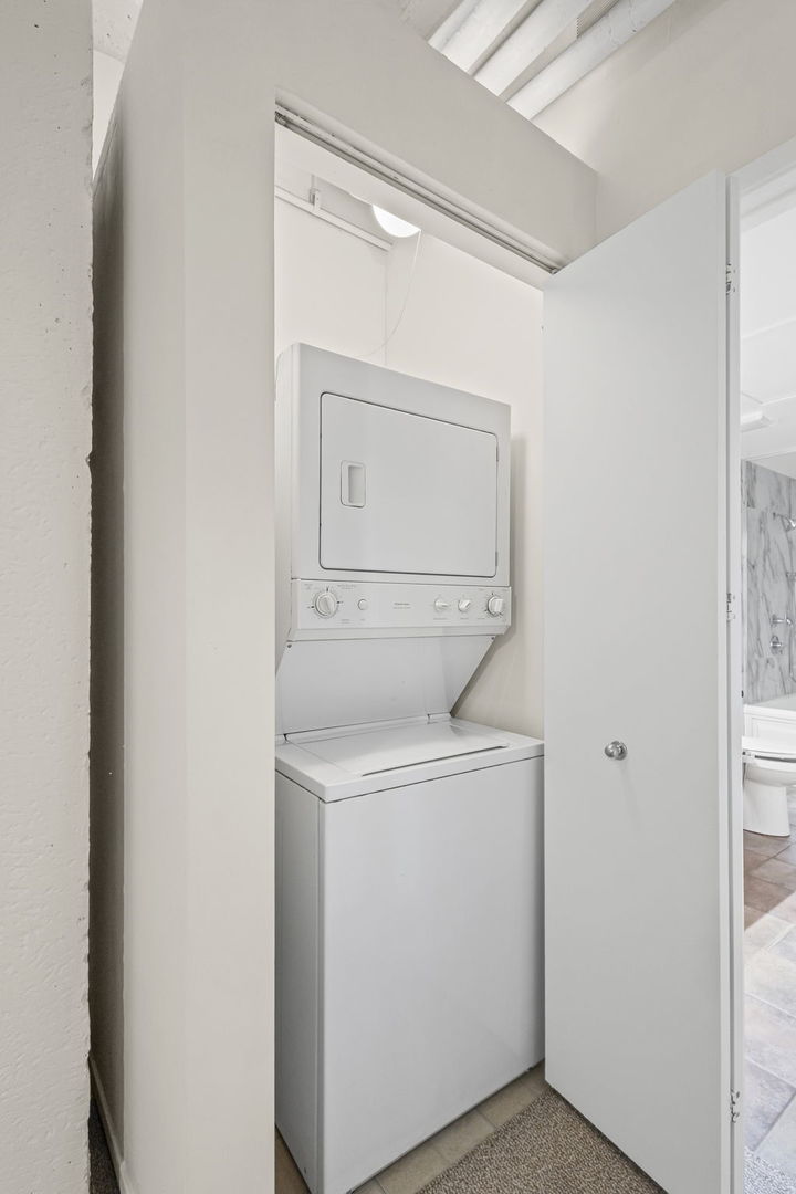 1530 South State Street, Unit 706 Chicago, IL 60605 - Photo 18 of 24 a utility room with dryer and washer