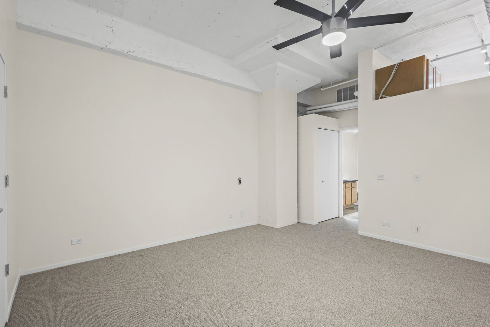 1530 South State Street, Unit 706 Chicago, IL 60605 - Photo 6 of 24 a view of an empty room