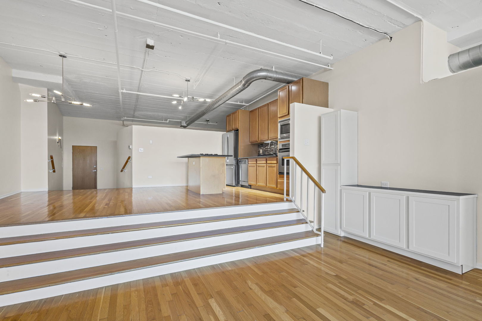 1530 South State Street, Unit 706 Chicago, IL 60605 - Photo 10 of 24 a view of entryway and hall with wooden floor