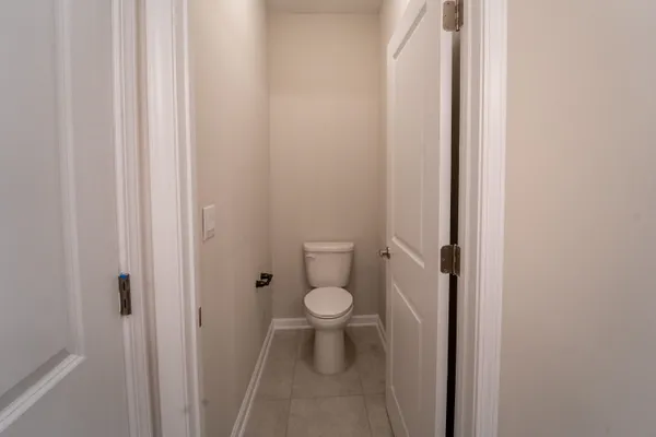 a bathroom with a toilet and a sink