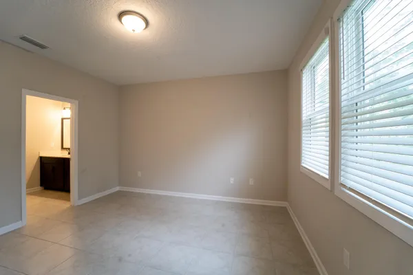 an empty room with windows