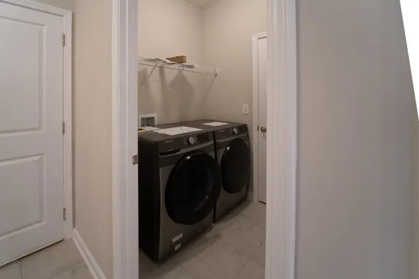 a utility room with dryer and washer