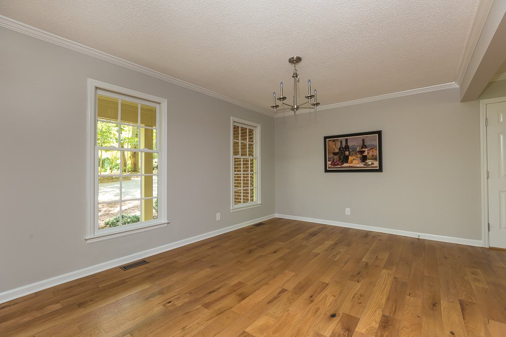 5508 Dutchman Drive Raleigh, NC 27606 - Photo 4 of 15 These gorgeous WOOD floors extend throughout the main level and also the staircase - nothing to do except move in! Dining Room