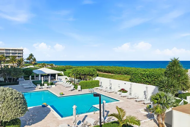 a view of house with outdoor space and seating