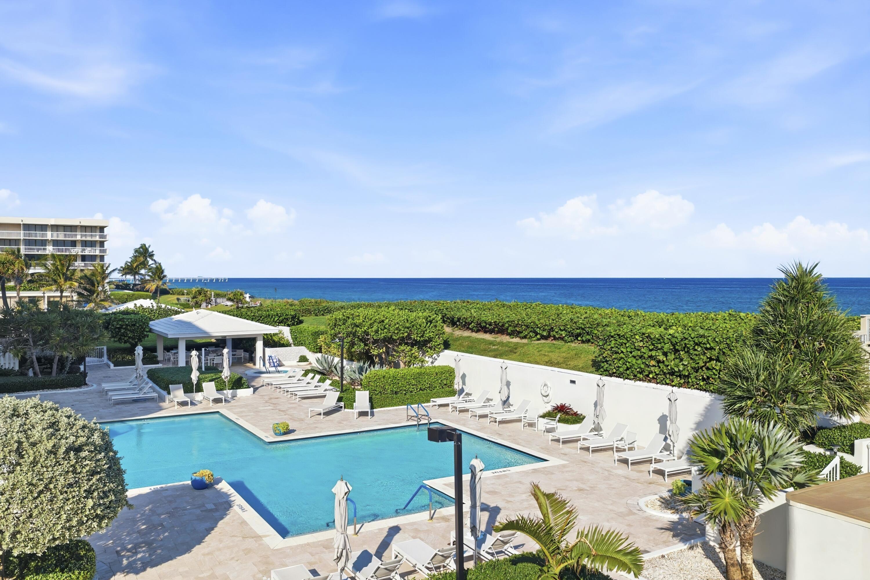 3300 South Ocean Boulevard, Unit 103S Palm Beach, FL 33480 - Photo 14 of 20 a view of house with outdoor space and seating