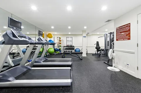 a view of a room with gym equipment