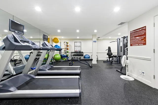a view of a room with gym equipment
