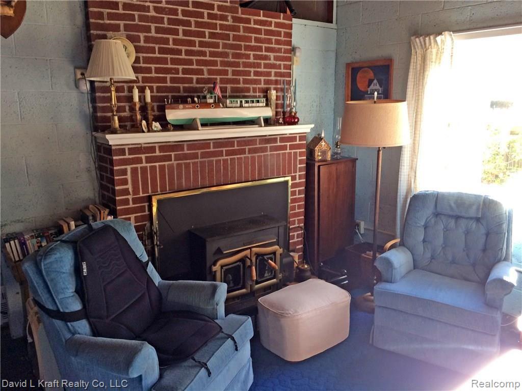 7280 Port Austin Road Caseville, MI 48725 - Photo 11 of 24 7280PtAustinFireplace.jpg