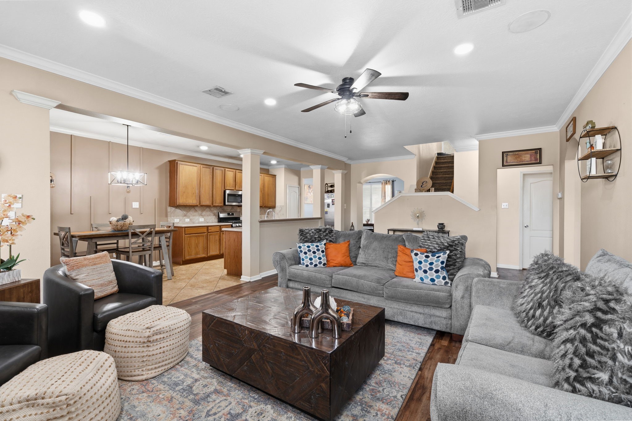 1319 Collier Point Lane Fresno, TX 77545 - Photo 6 of 33 The expansive living area features an open layout that connects beautifully with the kitchen and dining spaces, enhancing the home’s effortless flow.