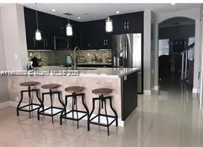 a bedroom with bed and view