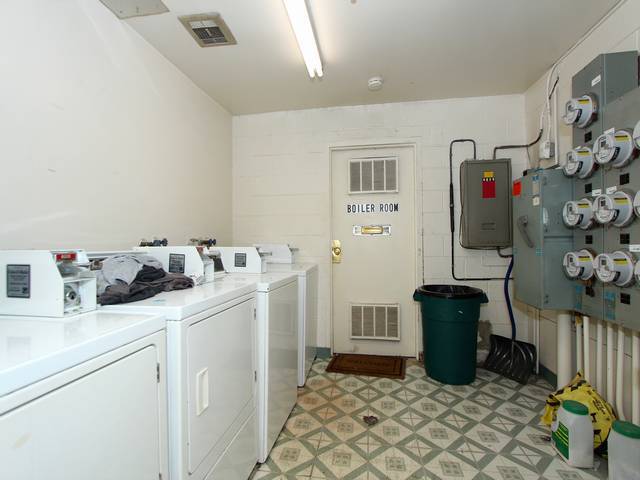 4839 West Engle Road, Unit 2D Alsip, IL 60803 - Photo 11 of 16 a kitchen with a sink and cabinets