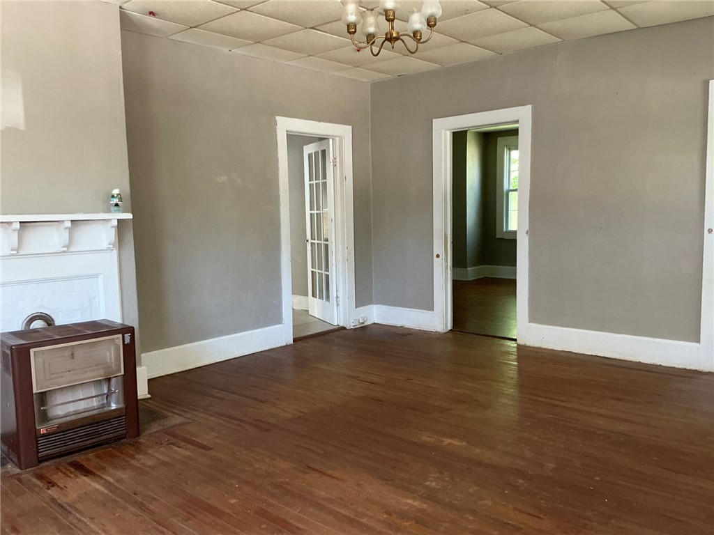 14 Ames Street Seneca, SC 29678 - Photo 2 of 15 This interior space features beautiful hardwood flooring and ample natural light.