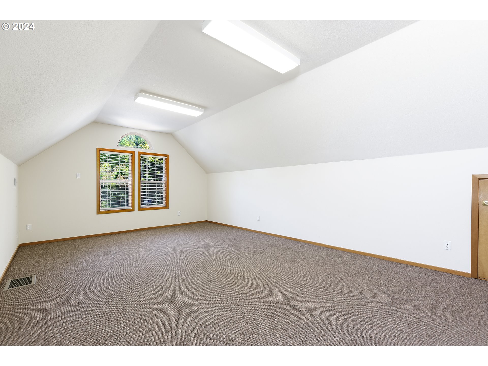 10202 South New Era Road Canby, OR 97013 - Photo 23 of 48 a view of a big room with windows and chandelier fan