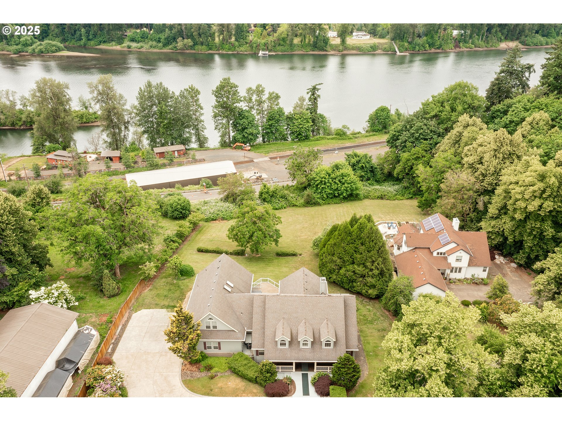 10202 South New Era Road Canby, OR 97013 - Photo 46 of 48 an aerial view of lake residential house with outdoor space and swimming pool