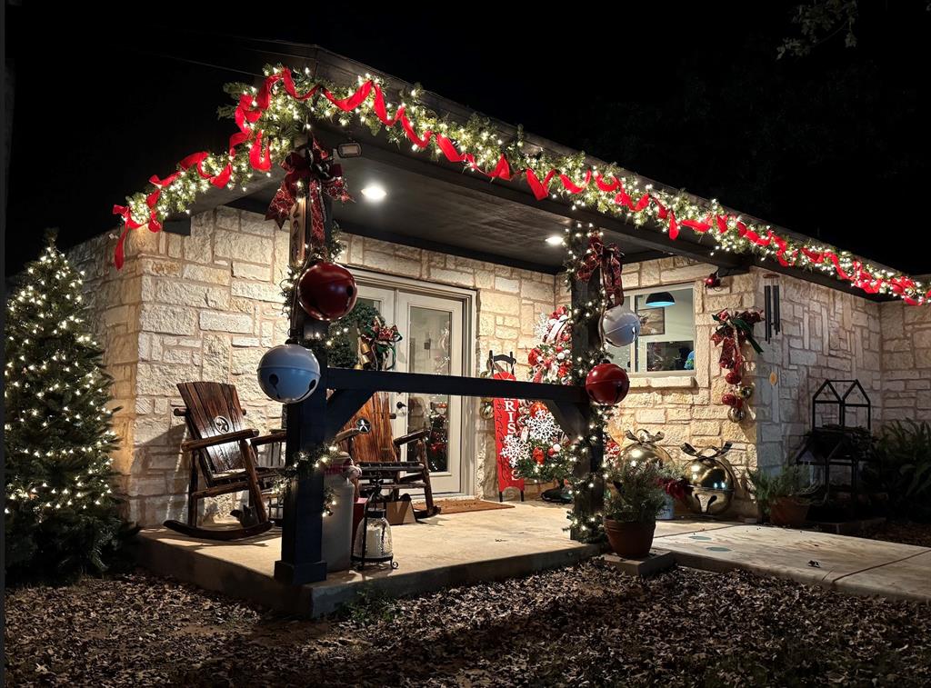 220 South Ash Street Springtown, TX 76082 - Photo 1 of 40 a view of entryway and flowers