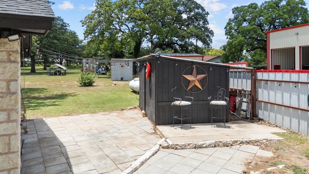 220 South Ash Street Springtown, TX 76082 - Photo 10 of 40 a view of outdoor space and entertaining space