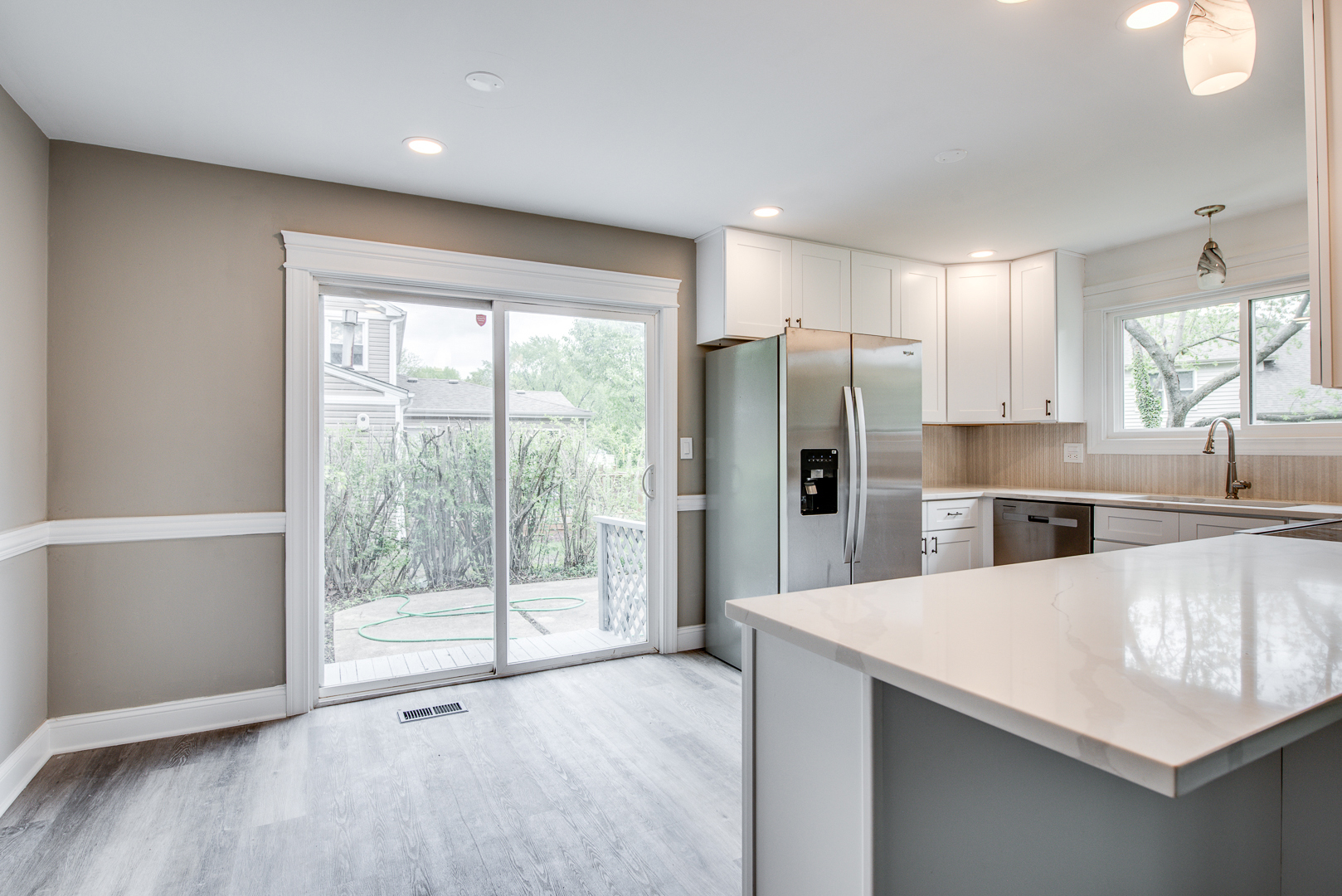106 Foxcroft Road Naperville, IL 60565 - Photo 9 of 21 a kitchen with stainless steel appliances a refrigerator and a sink
