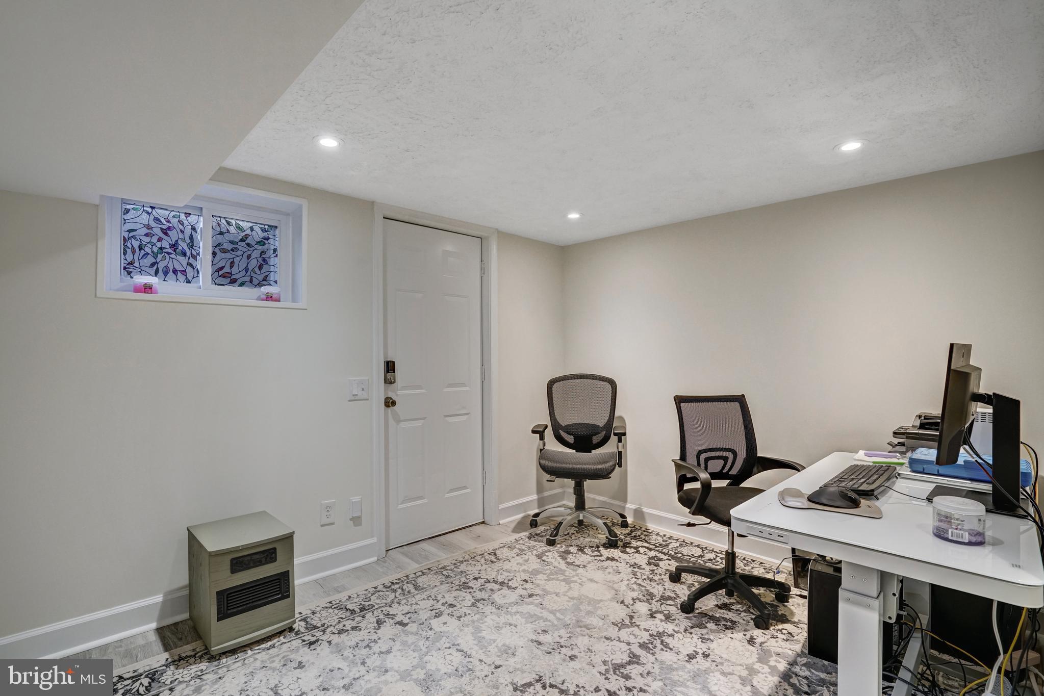 8941 Burke Lake Road Springfield, VA 22151 - Photo 31 of 34 a view of a workspace with furniture