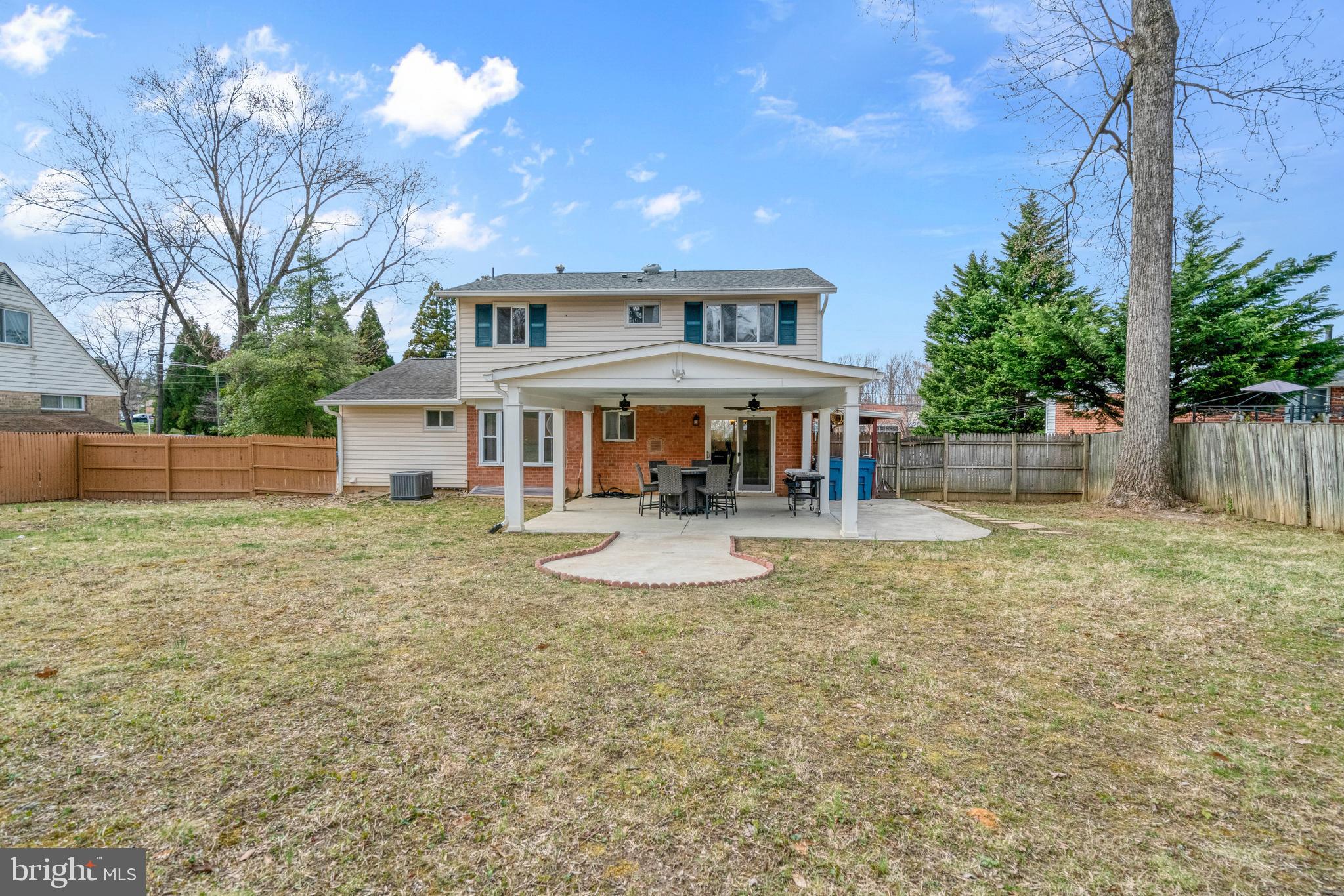 8941 Burke Lake Road Springfield, VA 22151 - Photo 32 of 34 front view of a house with a yard