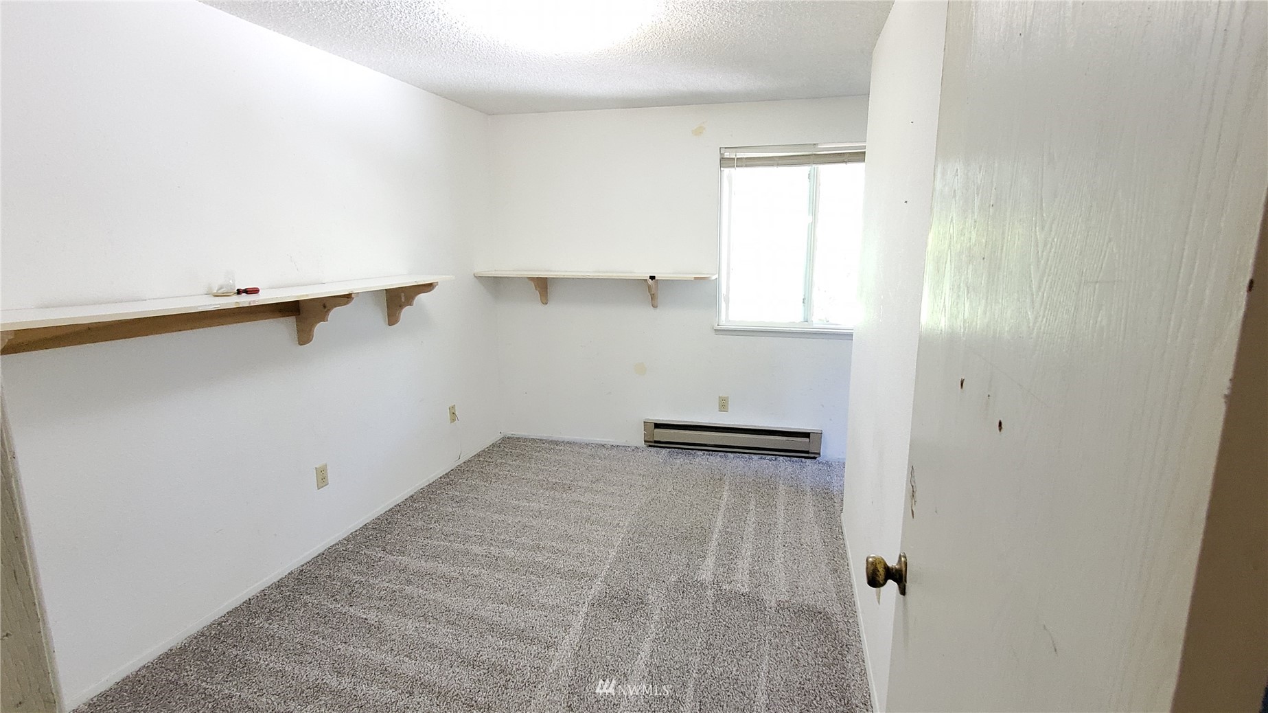 21603 9th Place West Bothell, WA 98021 - Photo 23 of 28 a view of an empty room with a window