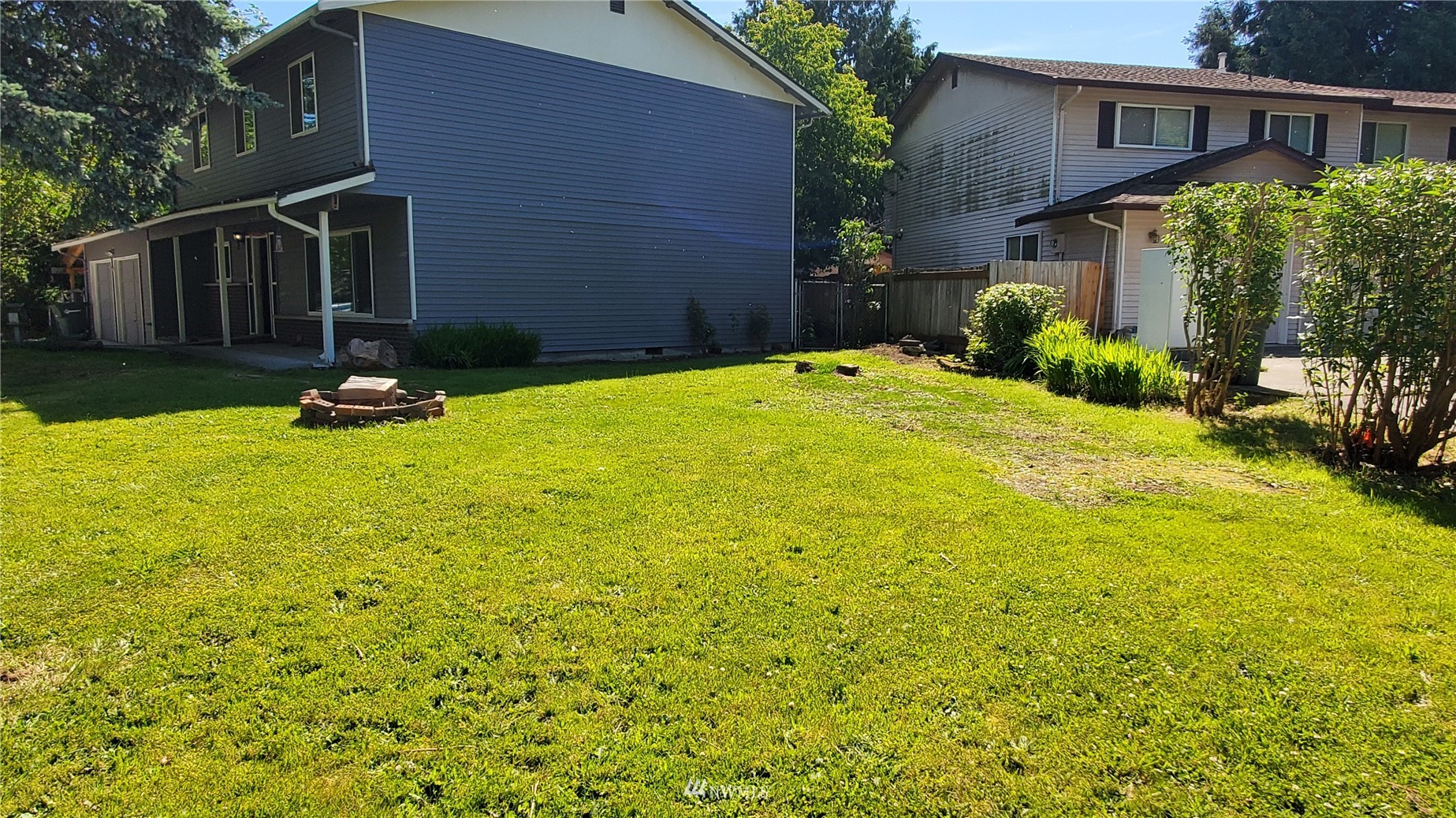 21603 9th Place West Bothell, WA 98021 - Photo 4 of 28 a front view of a house with yard