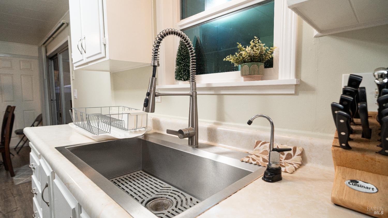 401 Frisbie Avenue Santa Rosa, CA 95407 - Photo 14 of 50 a close view of sink and tap