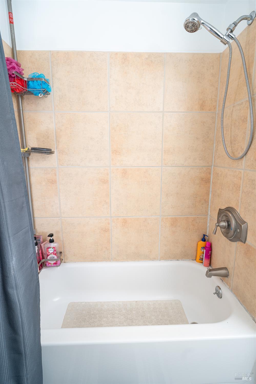 401 Frisbie Avenue Santa Rosa, CA 95407 - Photo 29 of 50 a bathroom with a bathtub and shower