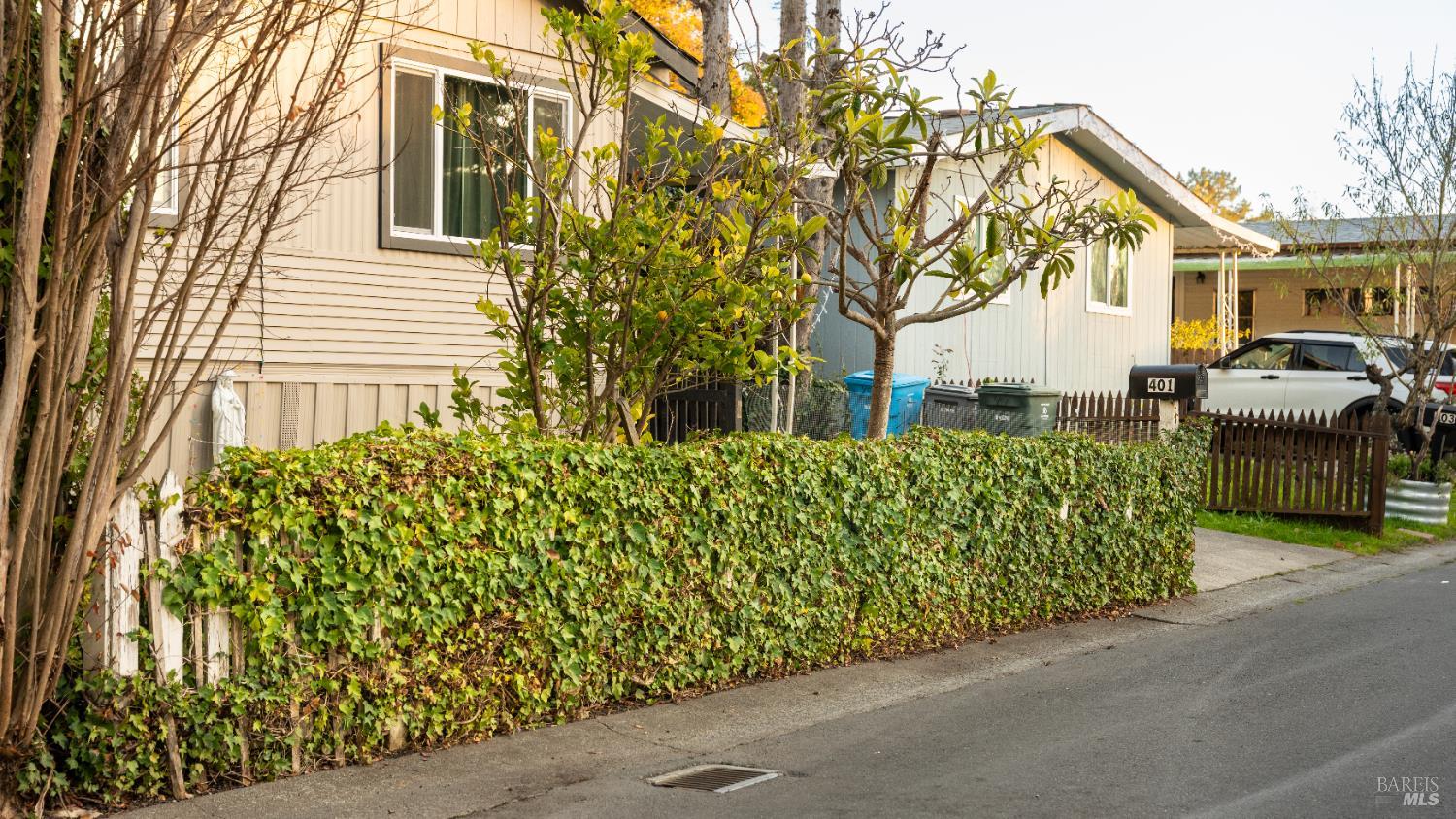 401 Frisbie Avenue Santa Rosa, CA 95407 - Photo 42 of 50 a front view of a house with a garden