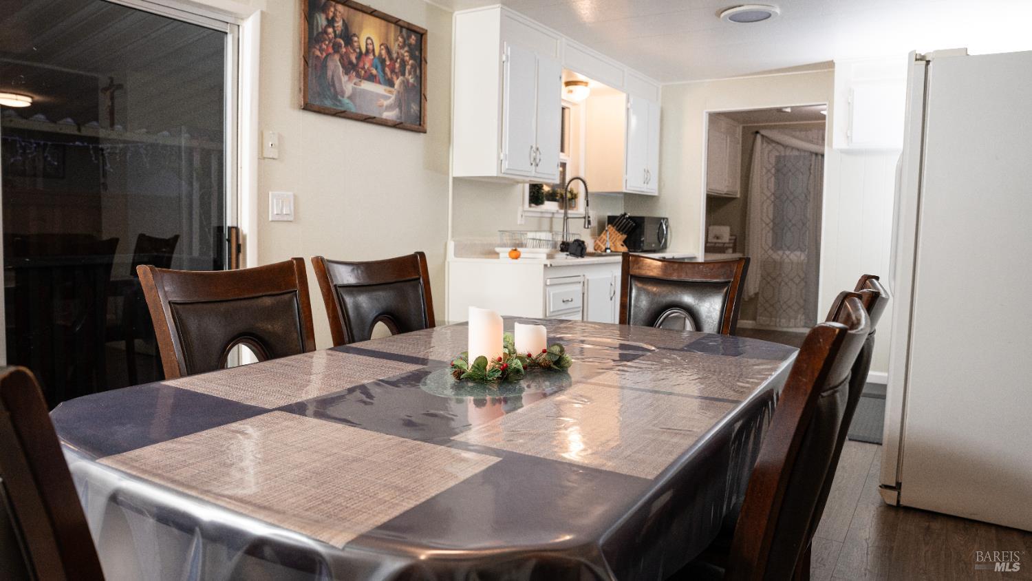 401 Frisbie Avenue Santa Rosa, CA 95407 - Photo 49 of 50 a view of a dining room with furniture