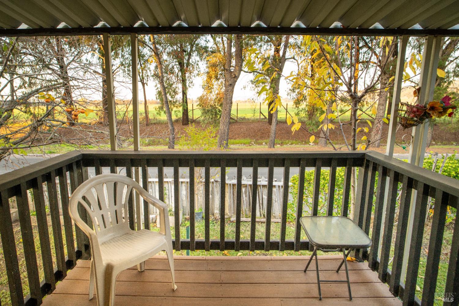 401 Frisbie Avenue Santa Rosa, CA 95407 - Photo 10 of 50 a view of a chair and table in the balcony