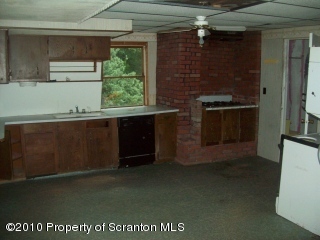1 Rr Factoryville, PA 18419 - Photo 3 of 10 a kitchen with a sink and large window