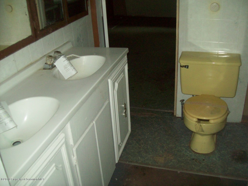 1 Rr Factoryville, PA 18419 - Photo 8 of 10 a bathroom with a sink and toilet
