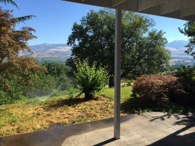 502 West Hilltop Road Talent, OR 97540 - Photo 25 of 34 a view of a yard