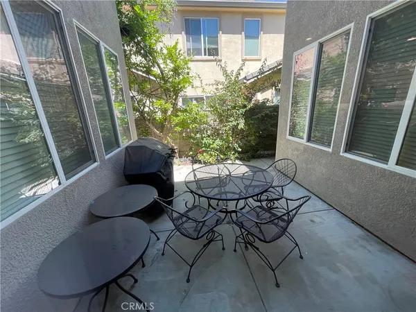 a view of outdoor space with signage and flags