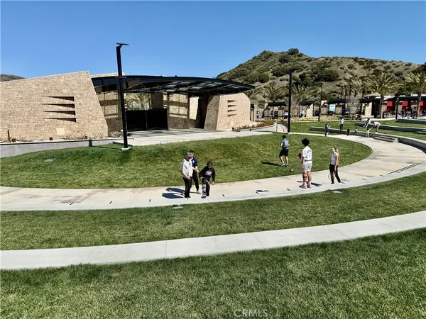 a view of a park with a slide
