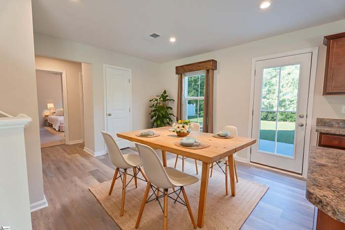 156 Queens Mill Court Pendleton, SC 29670 - Photo 6 of 18 Bright dining area with elegant flooring provides a delightful space for meals.
