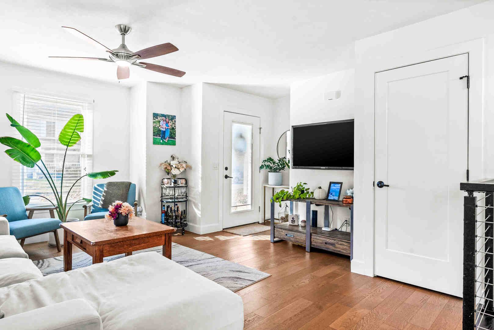 1402 River Landing Street Normal, IL 61761 - Photo 12 of 36 a living room with furniture and a flat screen tv