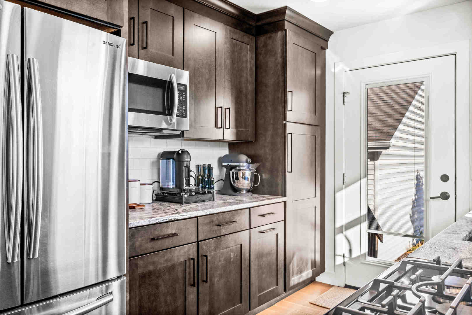 1402 River Landing Street Normal, IL 61761 - Photo 14 of 36 a kitchen with stainless steel appliances granite countertop a refrigerator and a sink