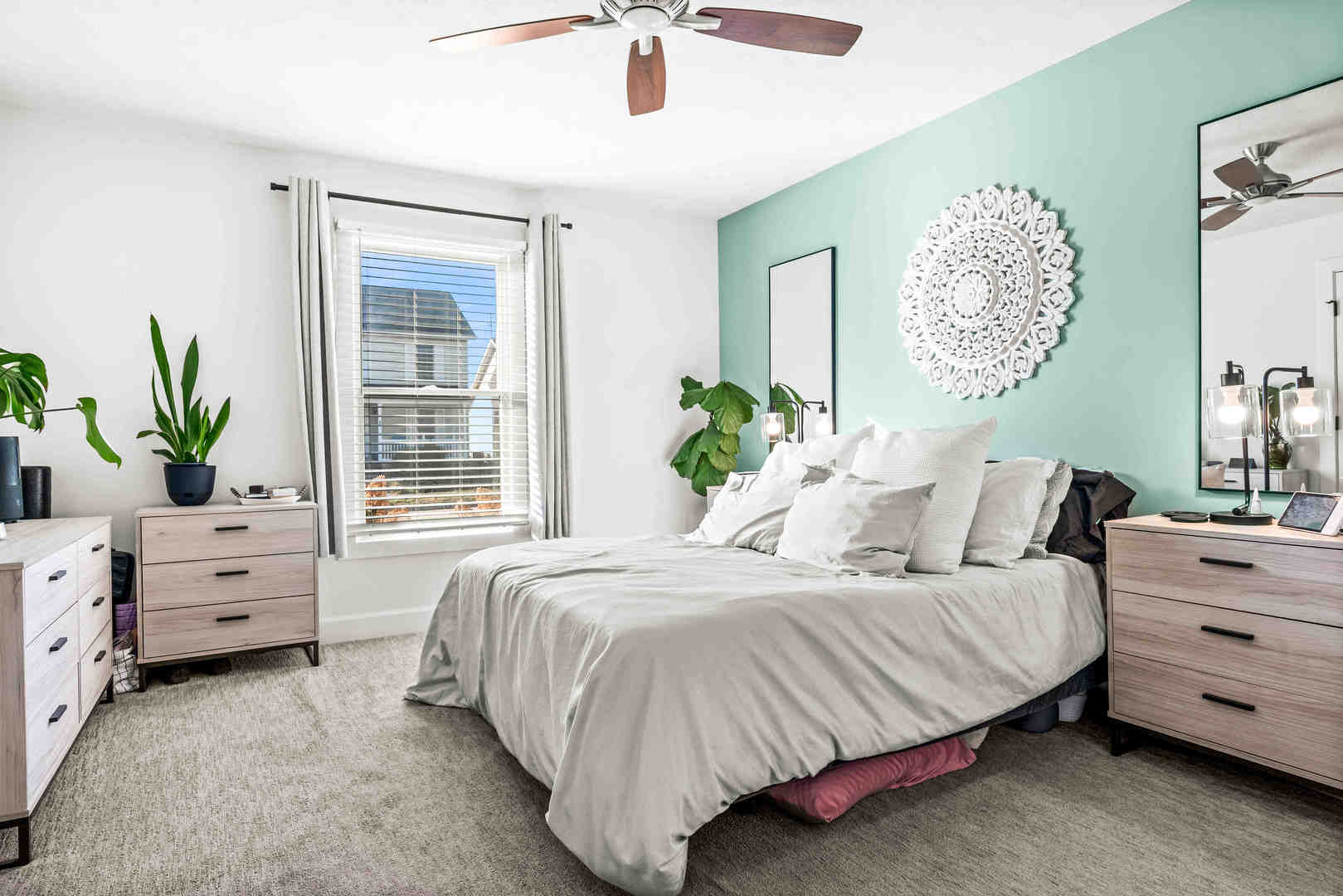 1402 River Landing Street Normal, IL 61761 - Photo 17 of 36 a bedroom with a bed and a window