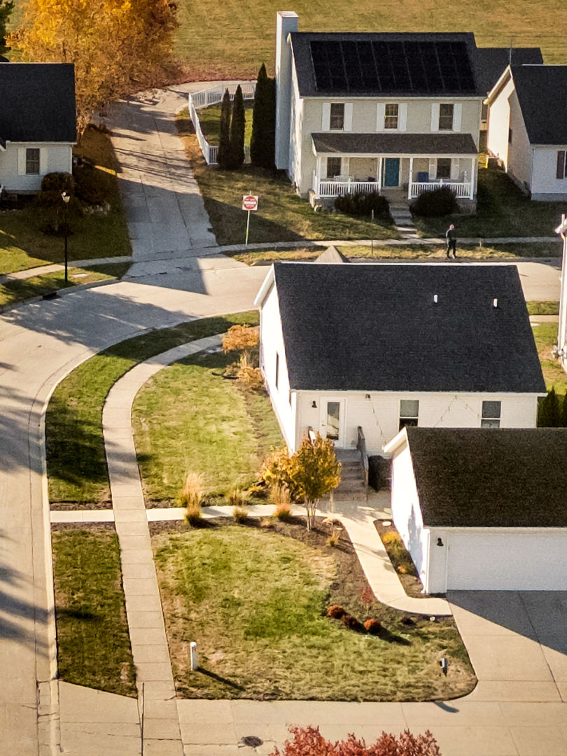 1402 River Landing Street Normal, IL 61761 - Photo 32 of 36 a view of a living room and kitchen