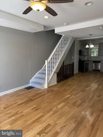 a view of livingroom with kitchen and furniture